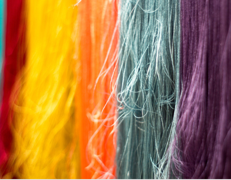 Does unfolding layers of stories from textiles help in their preservation? 